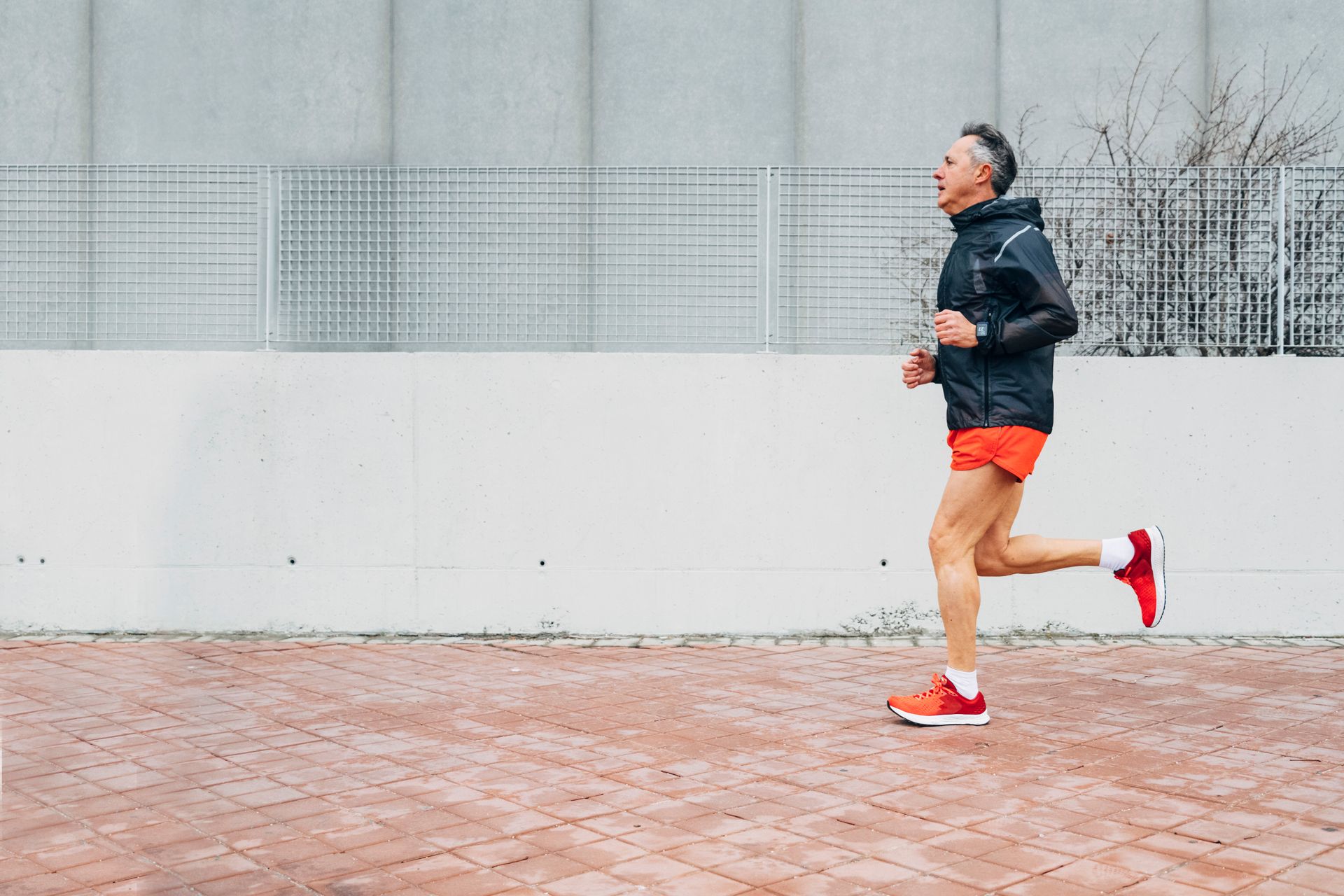 an elderly man running