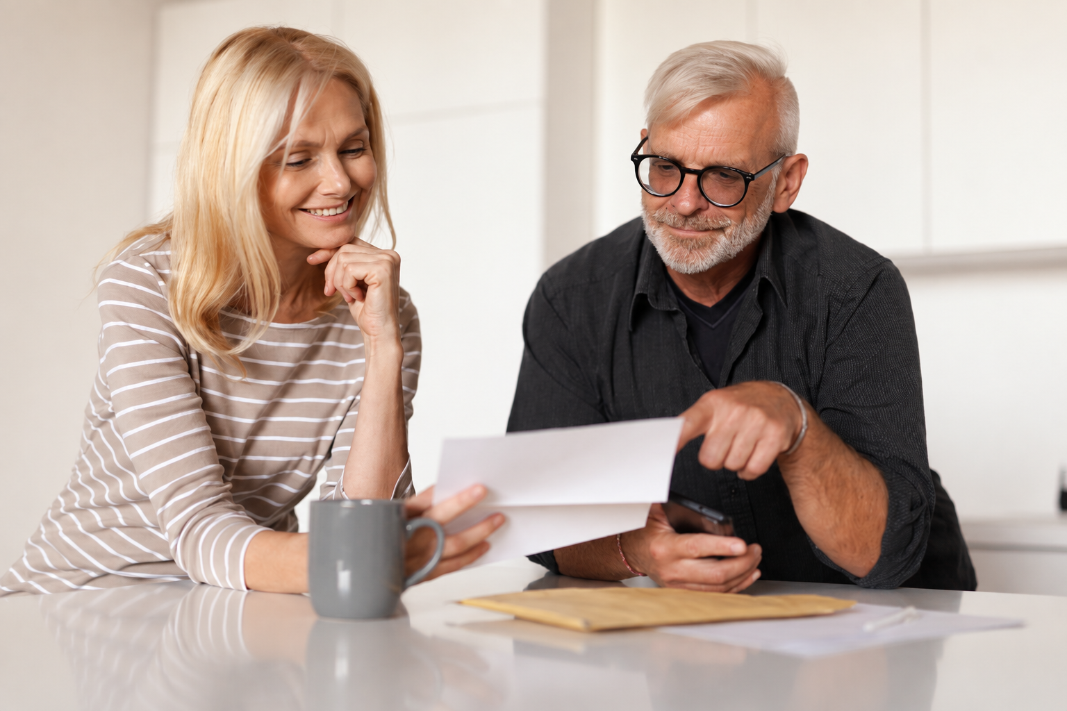 Two people reviewing a document at a table