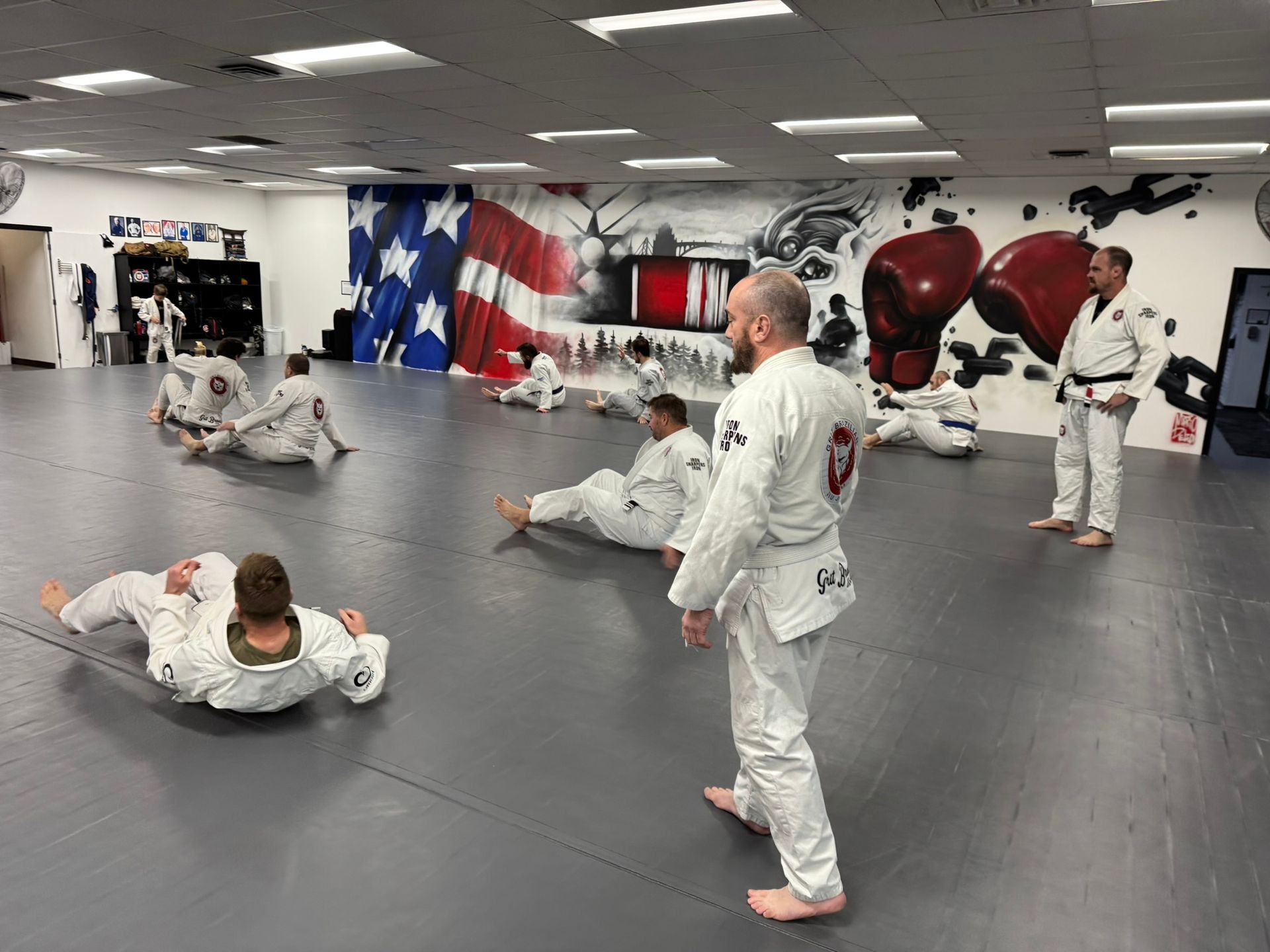 Students drilling Jiu-Jitsu guard passing at Grit Jiu-Jitsu & Muay Thai Martial Arts in Spokane Valley, WA for skill growth