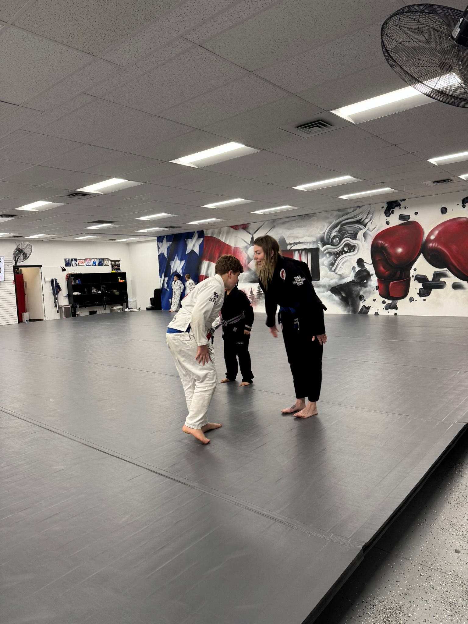 Kids practice safe grappling drills at Grit Jiu-Jitsu & Muay Thai Martial Arts in Spokane Valley, WA to build boundaries.