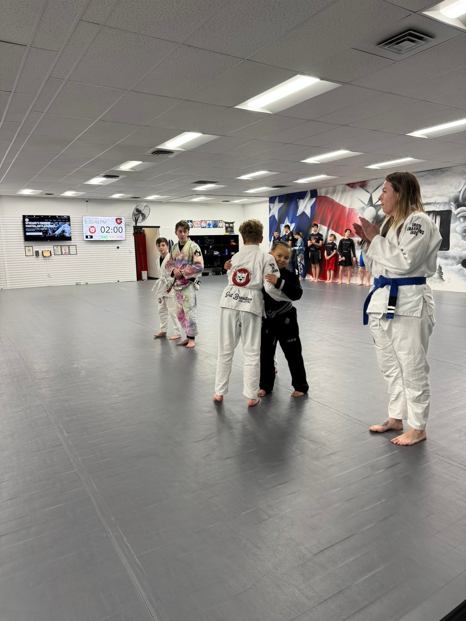 Kids practice controlled Youth Jiu-Jitsu drills at Grit Jiu-Jitsu & Muay Thai Martial Arts in Spokane Valley, WA for focus.