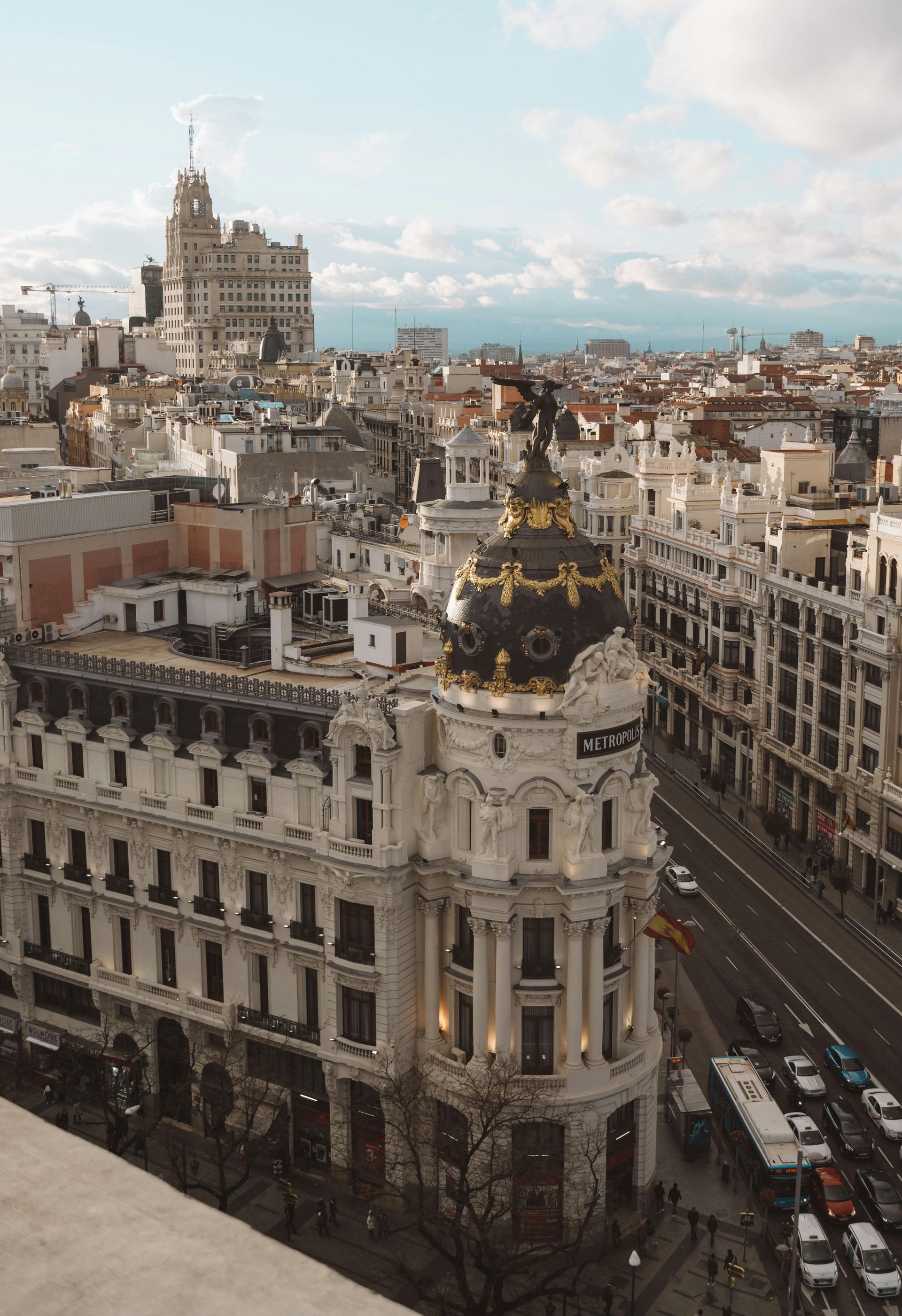 An aerial view of a city on a sunny day