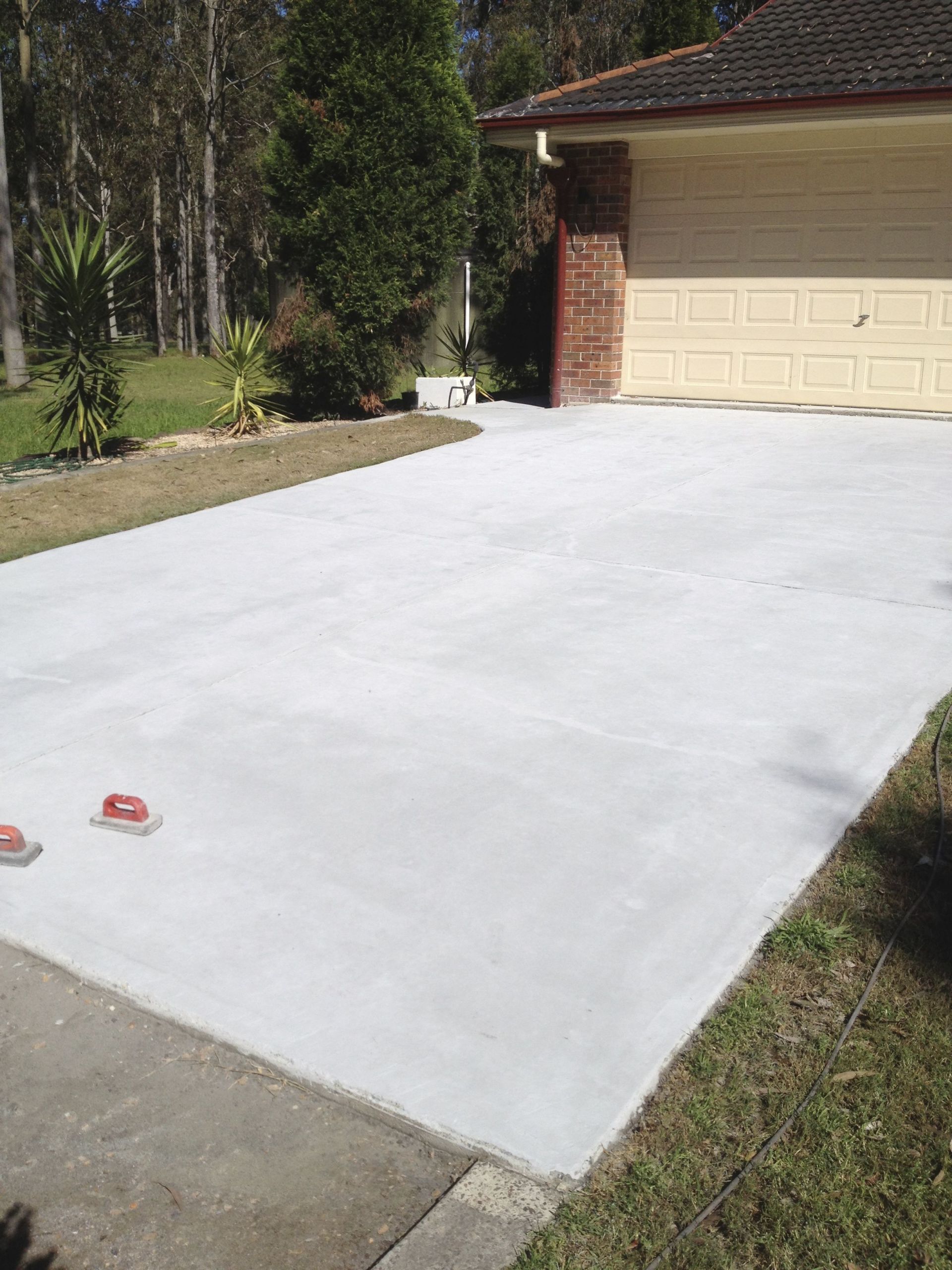 Driveways Stencils Concrete Before — Newcastle, NSW — Haitch’s Concrete Resurfacing