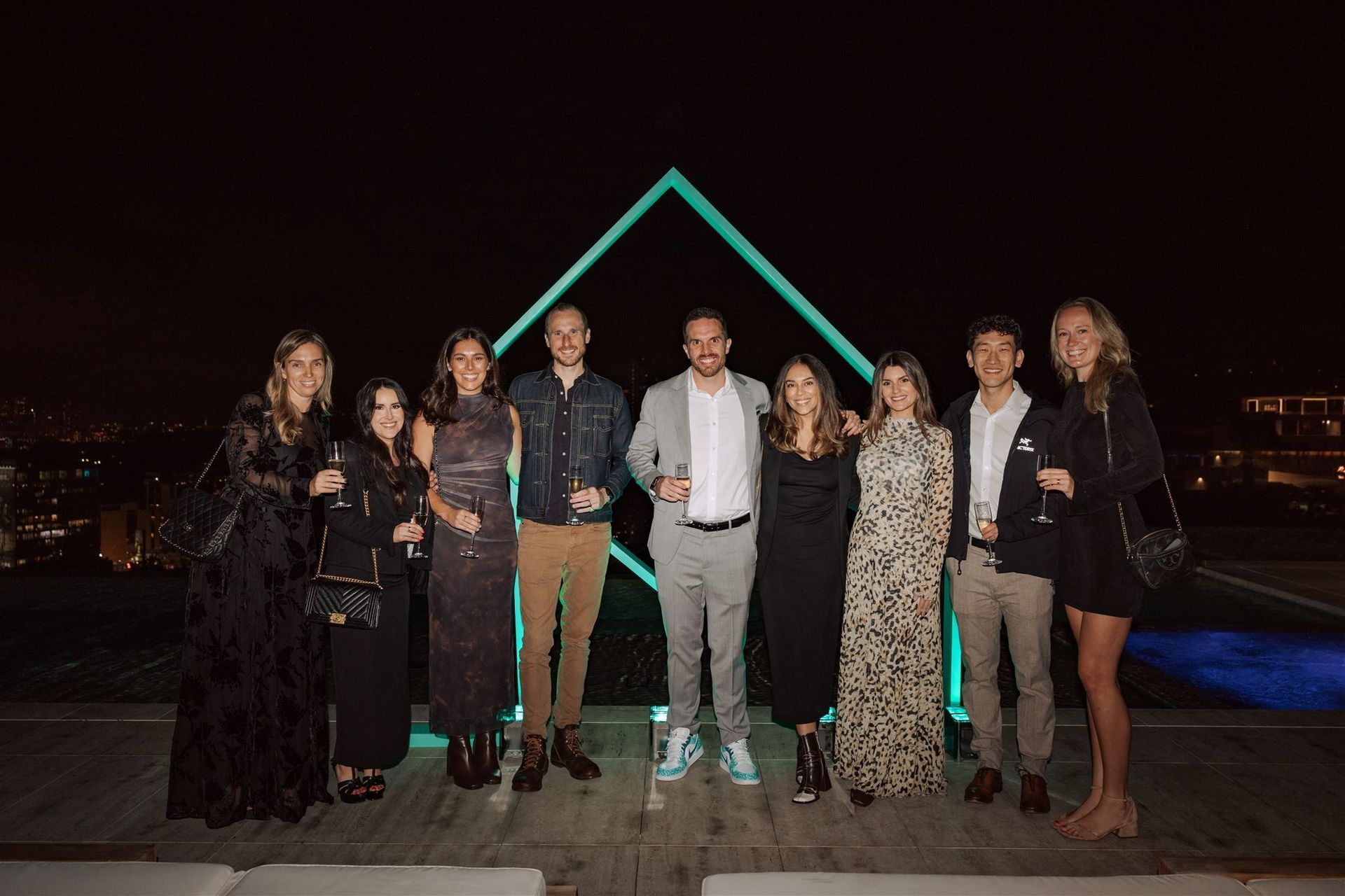 A credit card for homeowners, with a house model, calculator, and hands in a suit using a calculator.