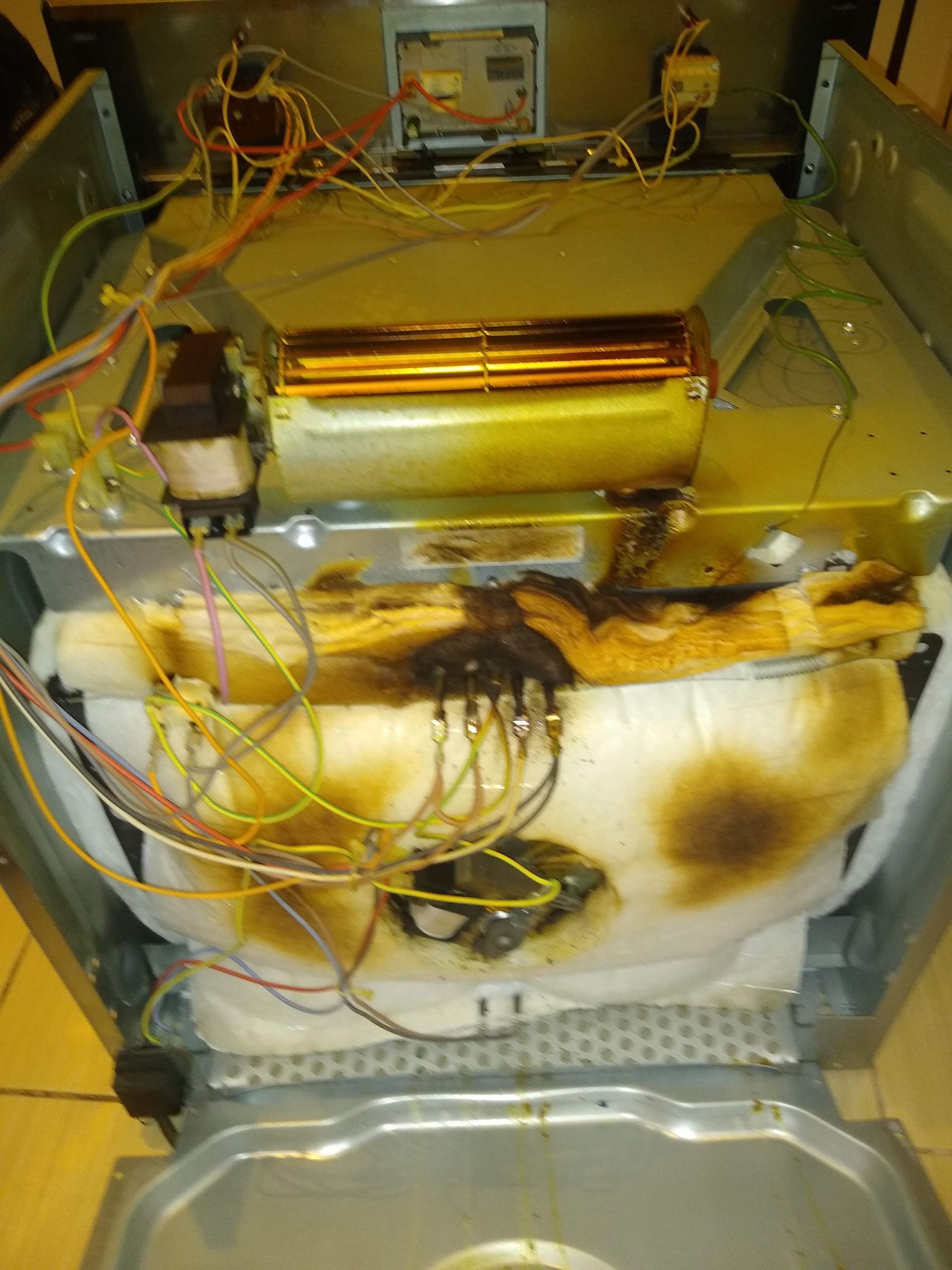 Failed Oven element being exposed in an appliance repair