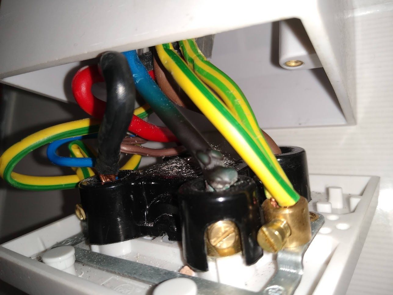 Overheated shower isolator, Shower was working, but an EICR found an underlaying issue