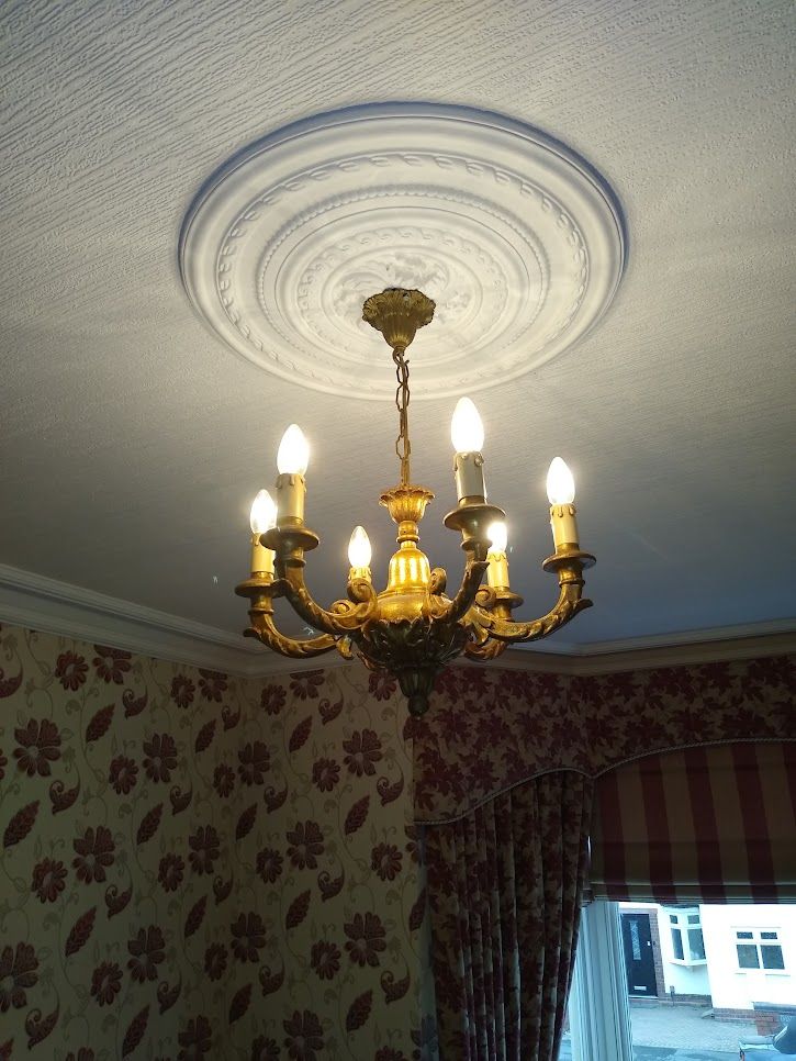 A decorative light fitting installed in a living room in Alcester