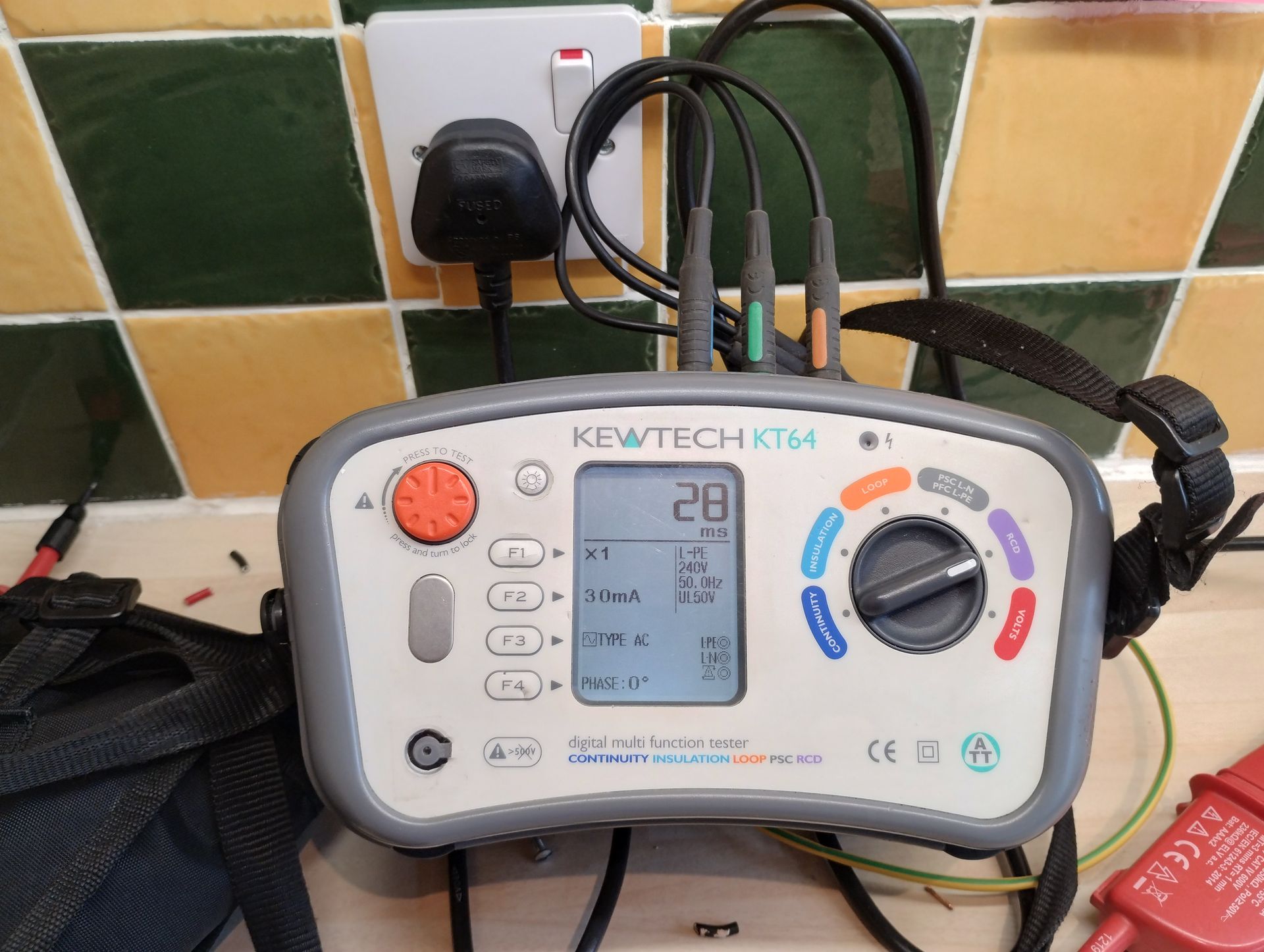 Kewtech Multi function tester showing test results