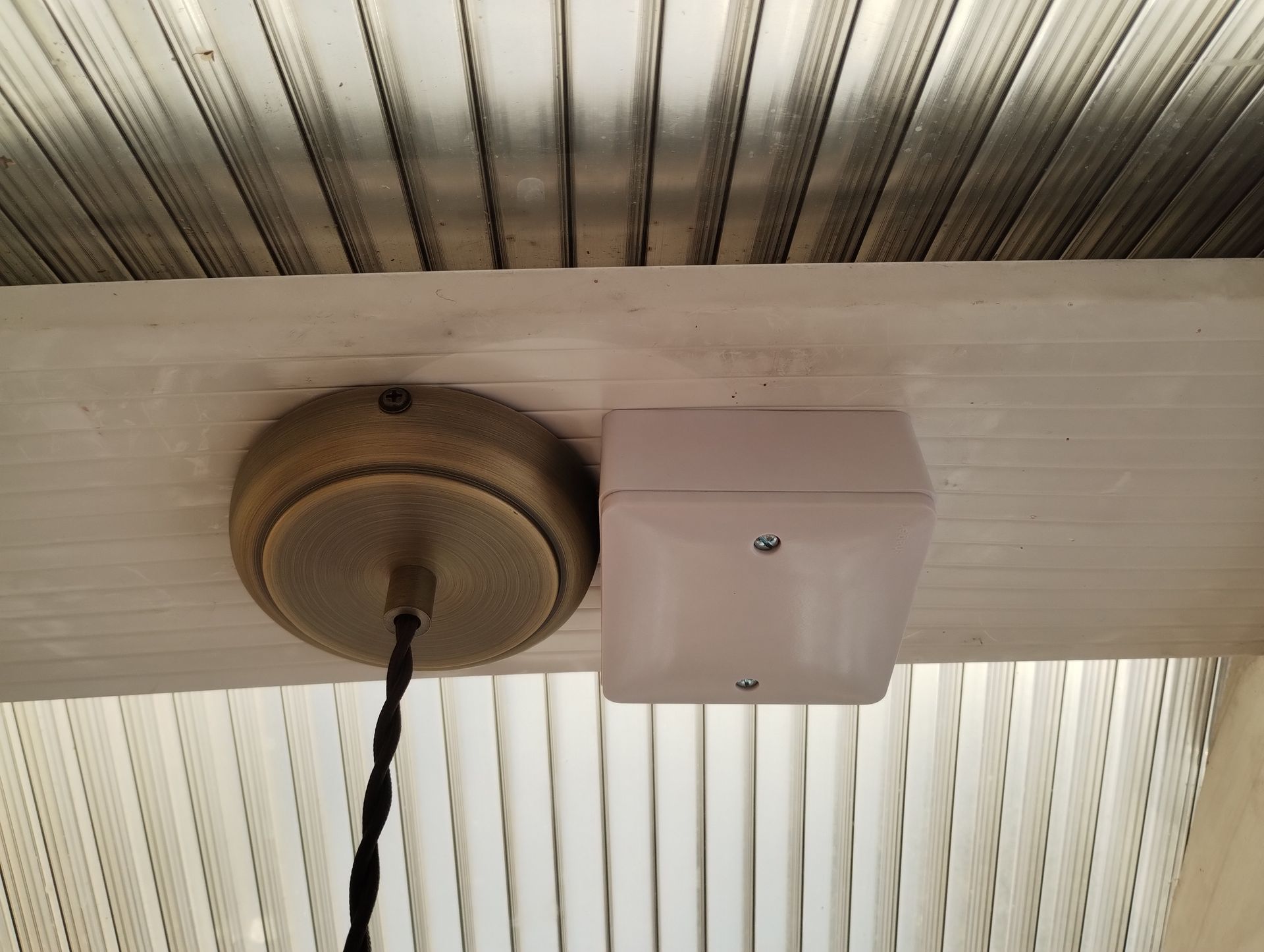 Pattress box next to light fitting in conservatory for wireless switch module