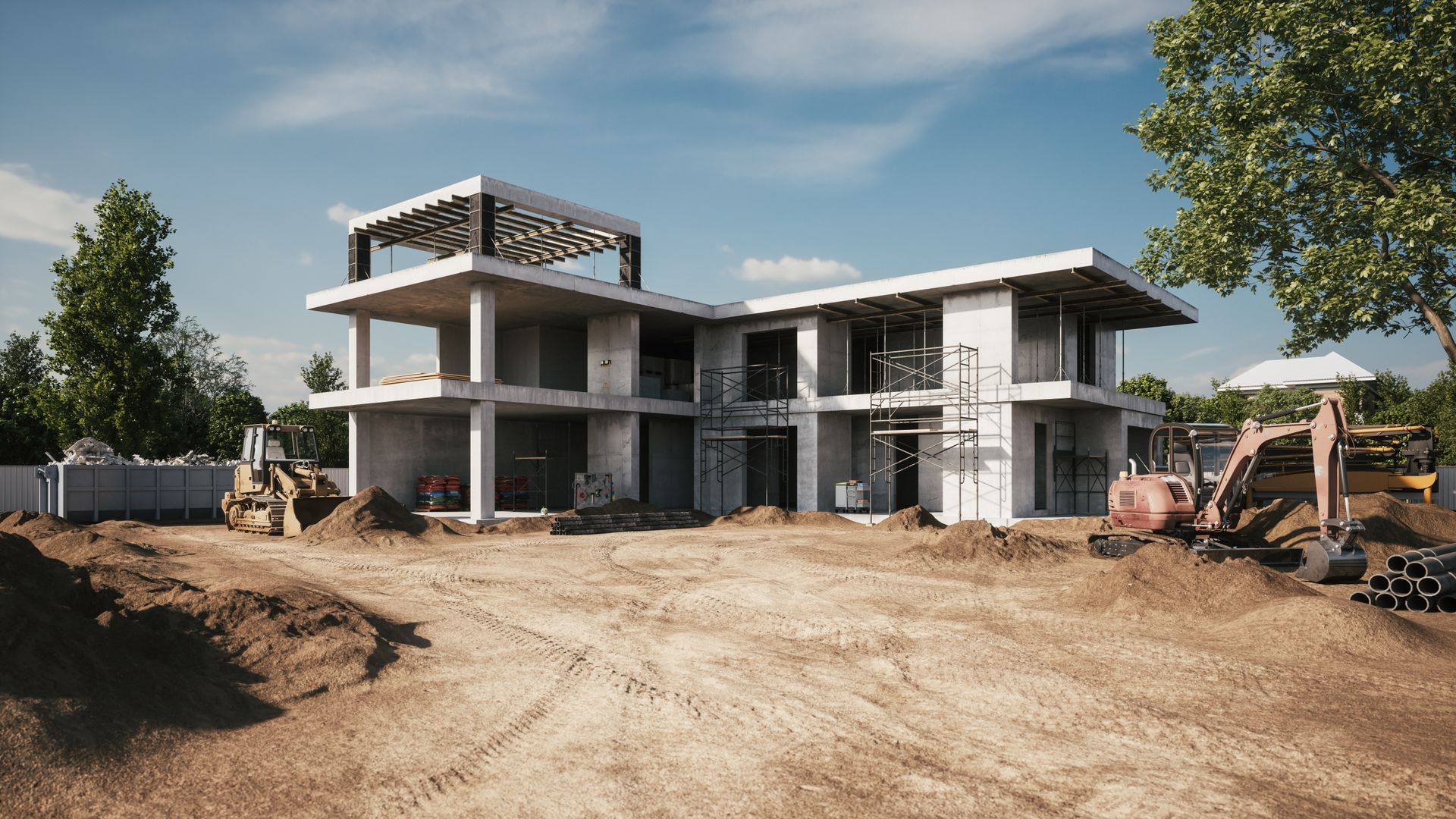 Partially built modern house on a dirt lot with construction equipment and a clear sky