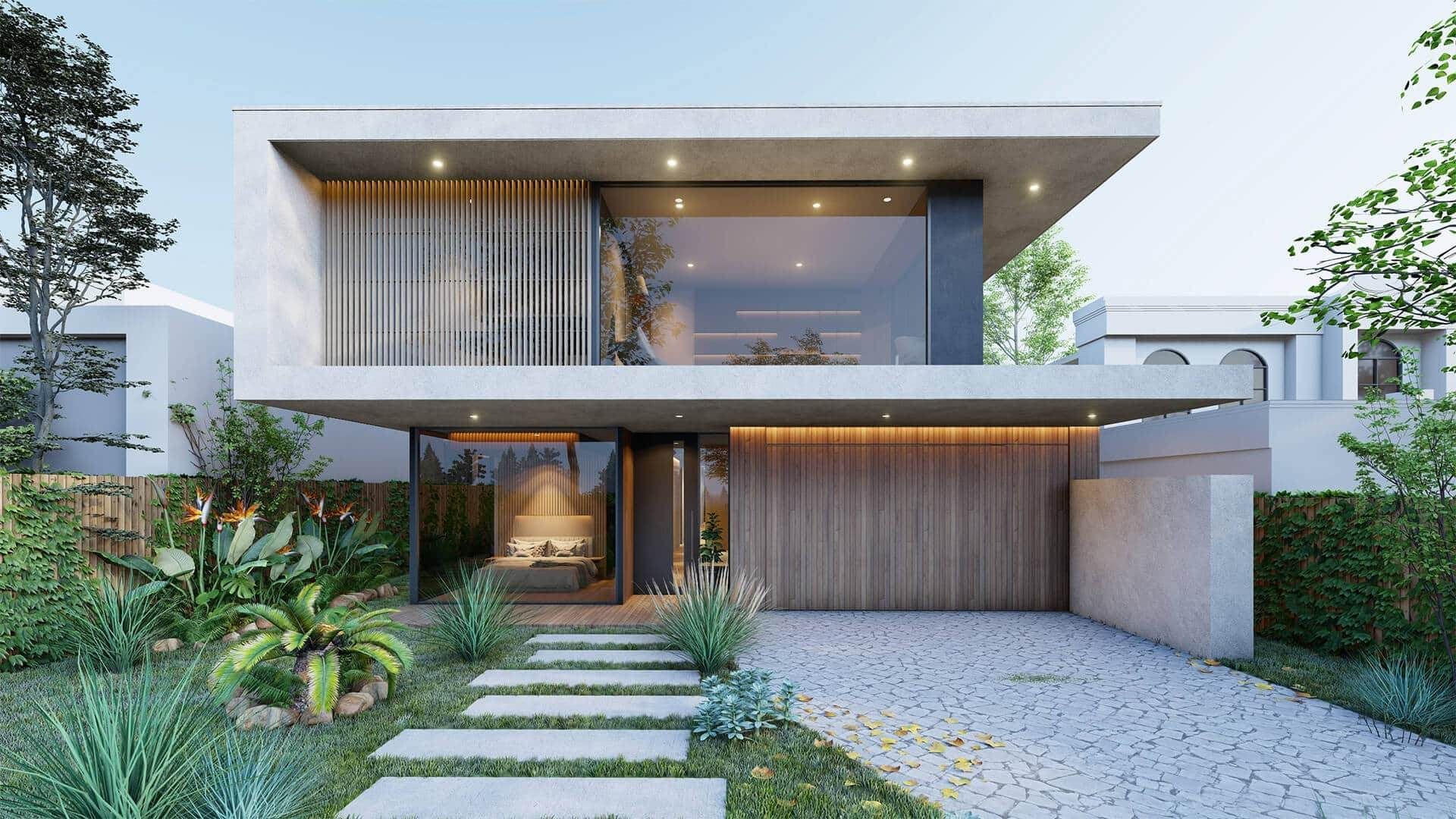 A modern house with a lot of windows and a driveway leading to it.
