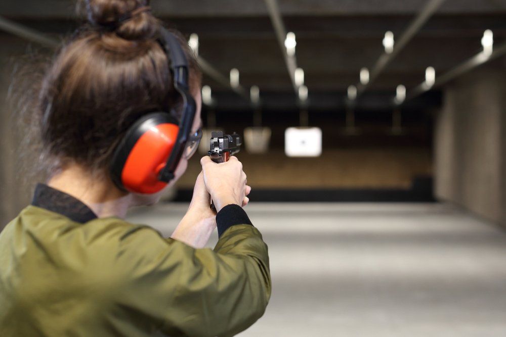 Woman Shooting With A Gun