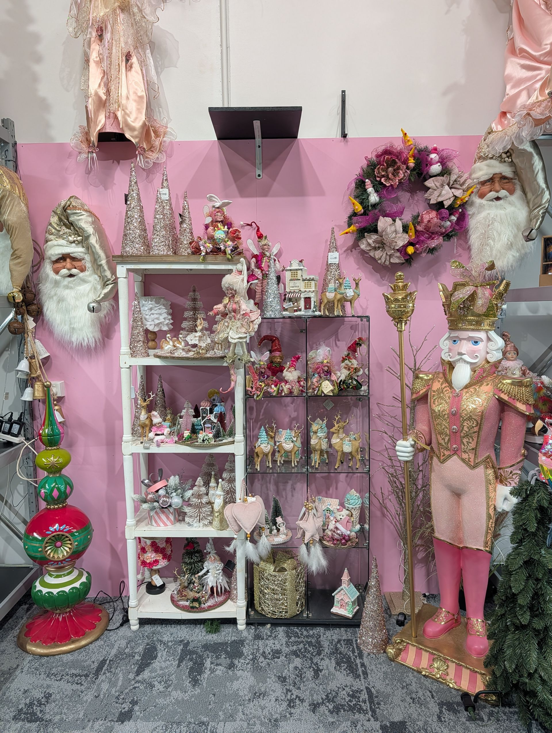 Pink Holiday Display with Santa Figures, Glittery Ornaments, and Festive Decorations — Jingle Bell Christmas In Goonellabah, NSW