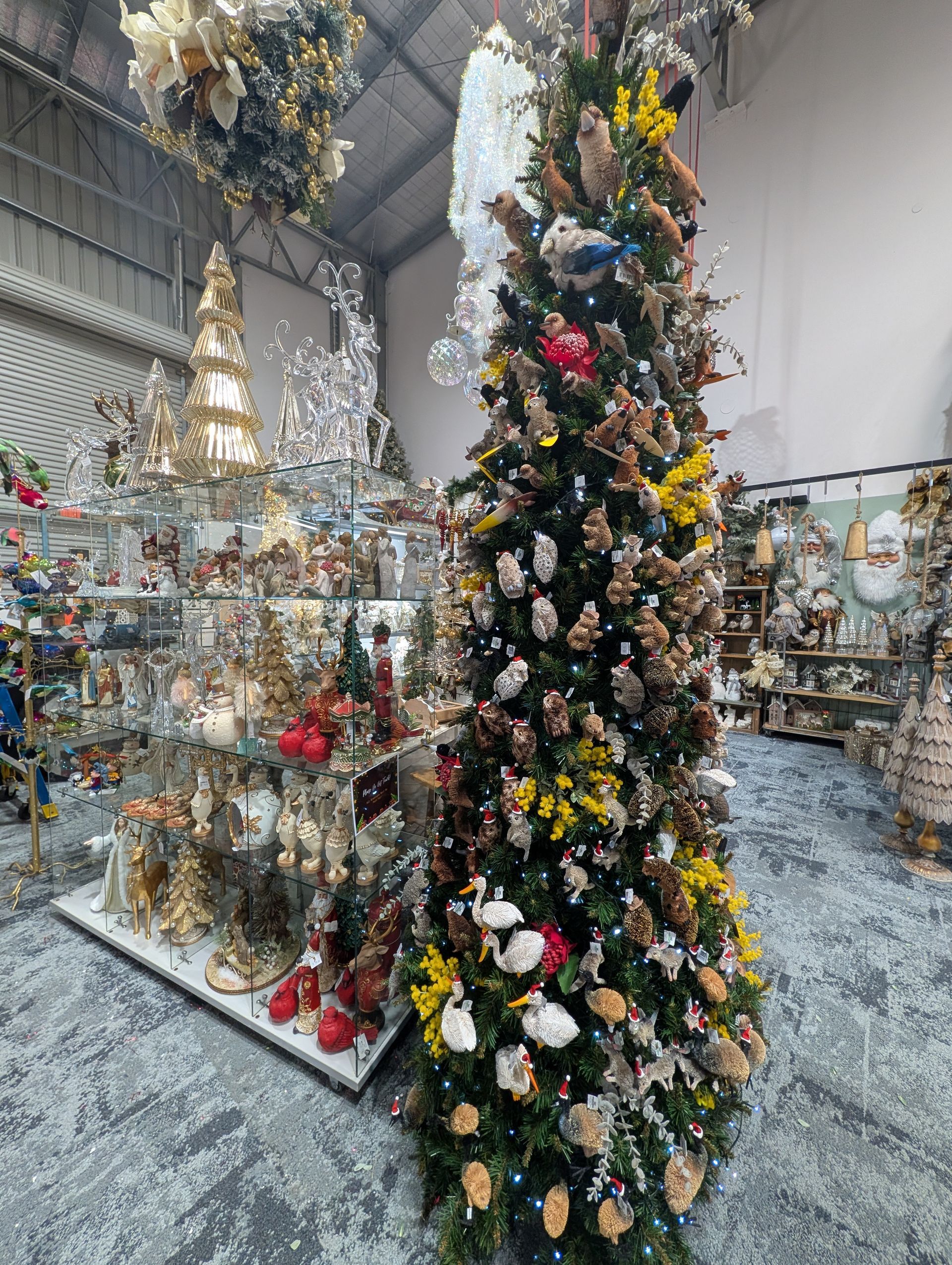 Christmas Tree Display in A Store, with A Tall Decorated Tree — Jingle Bell Christmas In Casino, NSW