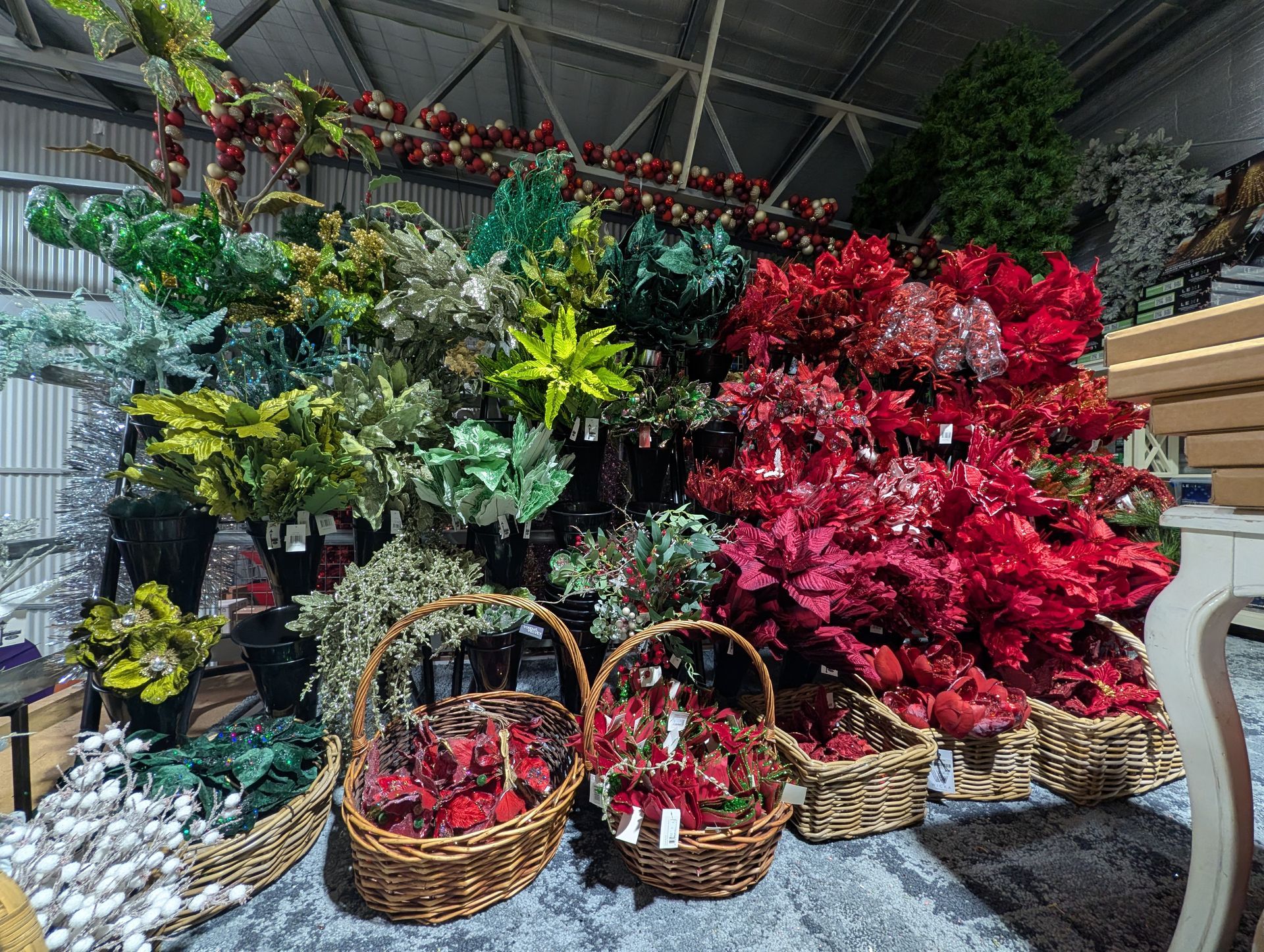 Wicker Baskets of Colorful Potted Flowers — Jingle Bell Christmas In Casino, NSW