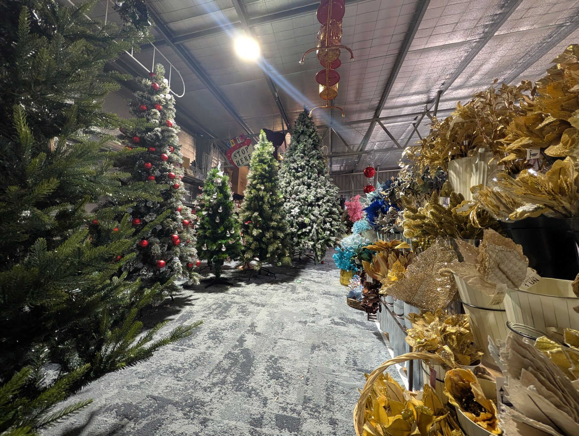 Indoor Christmas Tree Display Aisle with Decorated Artificial Trees — Jingle Bell Christmas In Casino, NSW