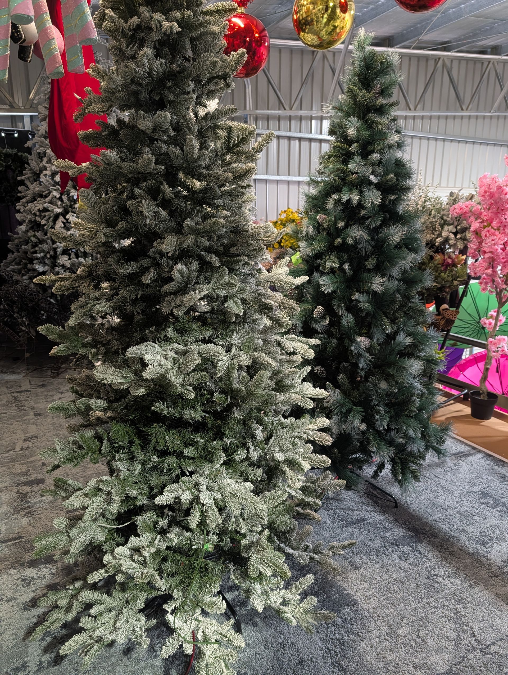 Two Artificial Christmas Trees, One Flocked White and One Dark Green — Jingle Bell Christmas In Casino, NSW