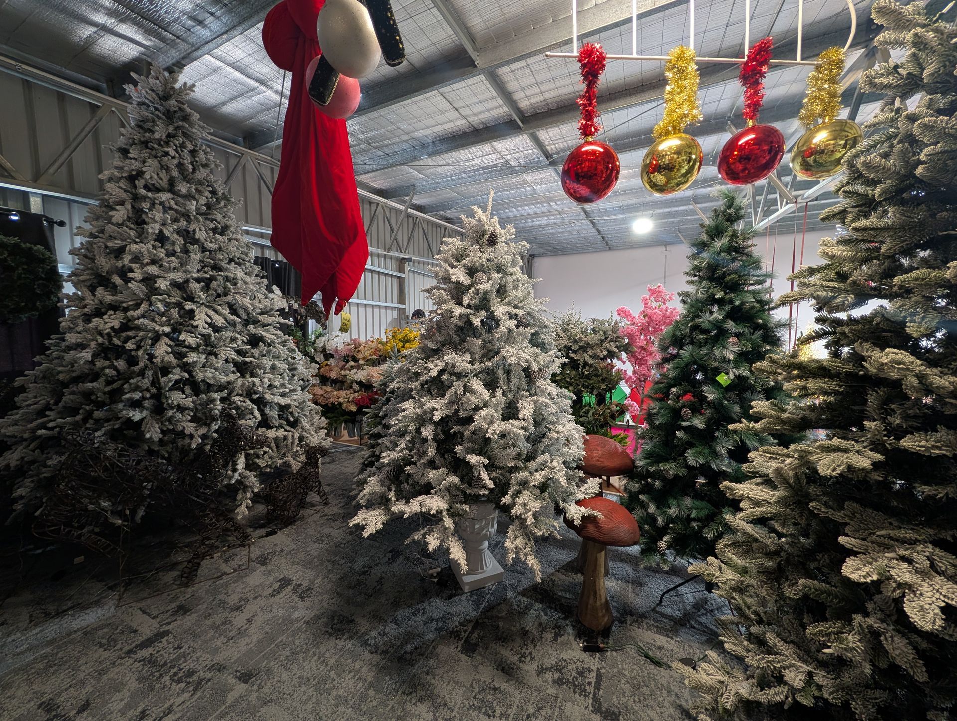 Snow-Covered Christmas Trees and Large Red-And-Gold Ornaments — Jingle Bell Christmas In Casino, NSW