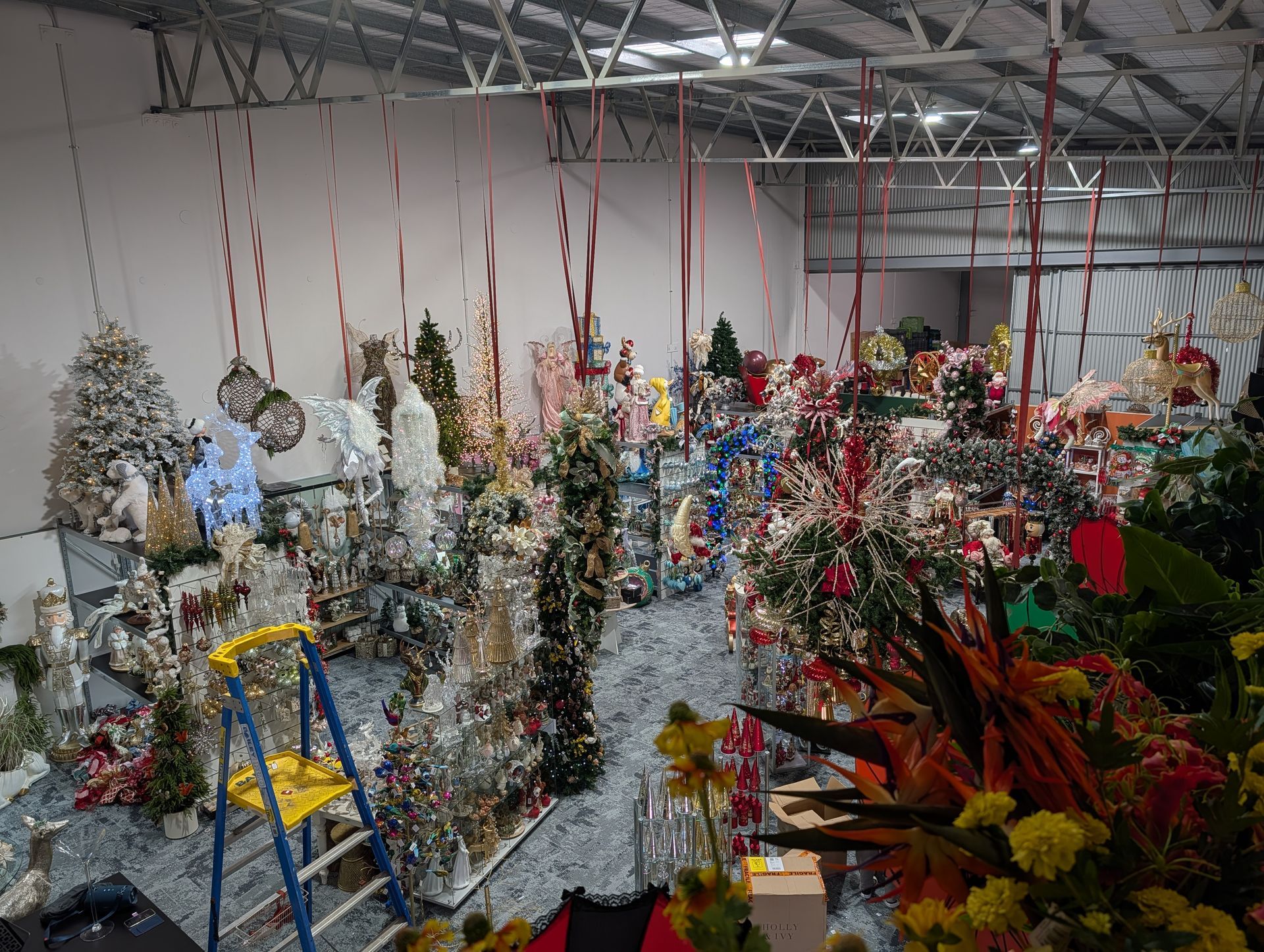 Rows of Colorful Floral Arrangements and Decorations — Jingle Bell Christmas In Casino, NSW