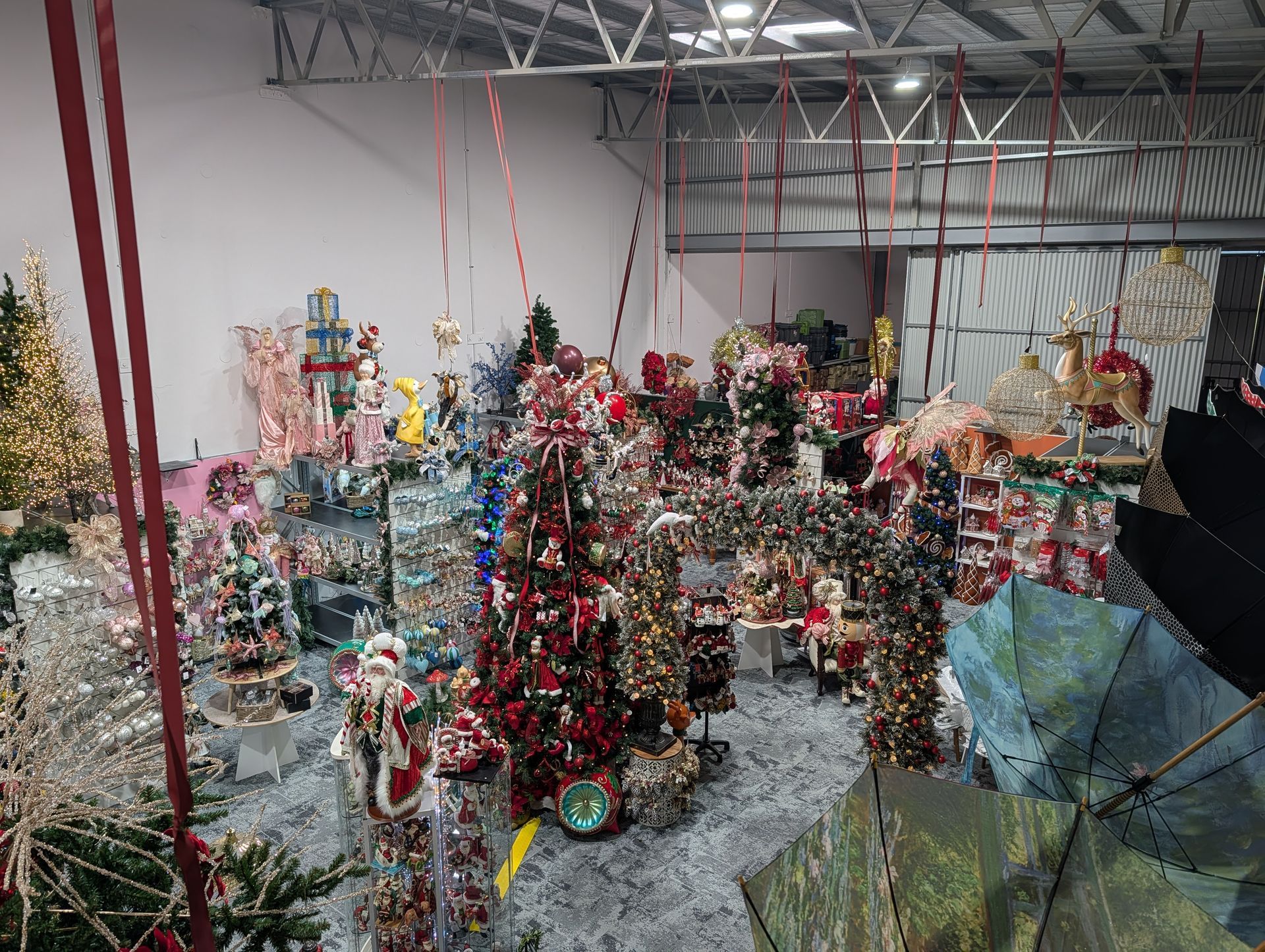 Indoor Holiday Display with Many Decorated Christmas Trees — Jingle Bell Christmas In Casino, NSW