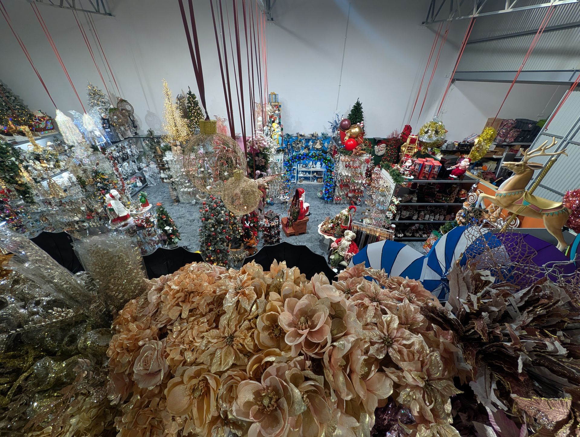Colorful Artificial Flower Arrangements Displayed Indoors — Jingle Bell Christmas In Casino, NSW
