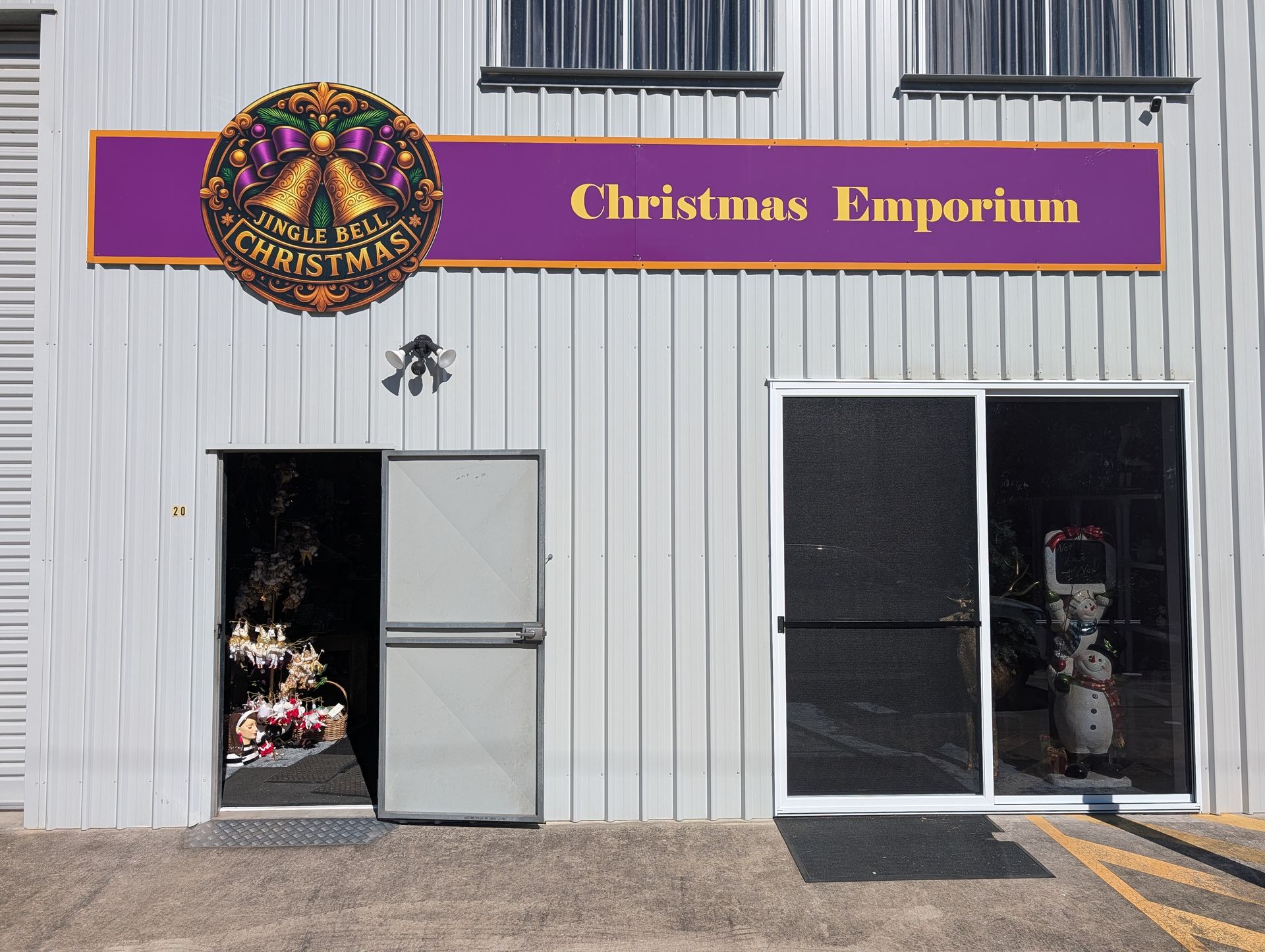 Christmas Emporium Storefront with Purple Sign — Jingle Bell Christmas In Casino, NSW