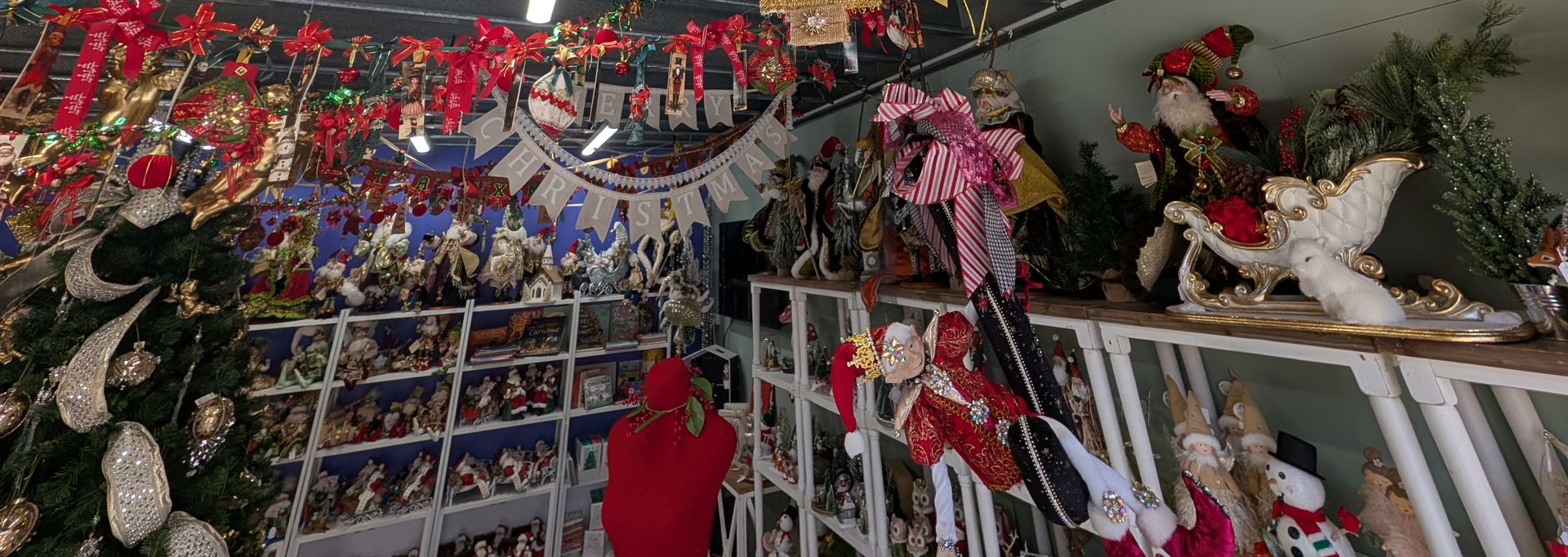 Holiday Display with Hanging Paper Garlands — Jingle Bell Christmas In Casino, NSW