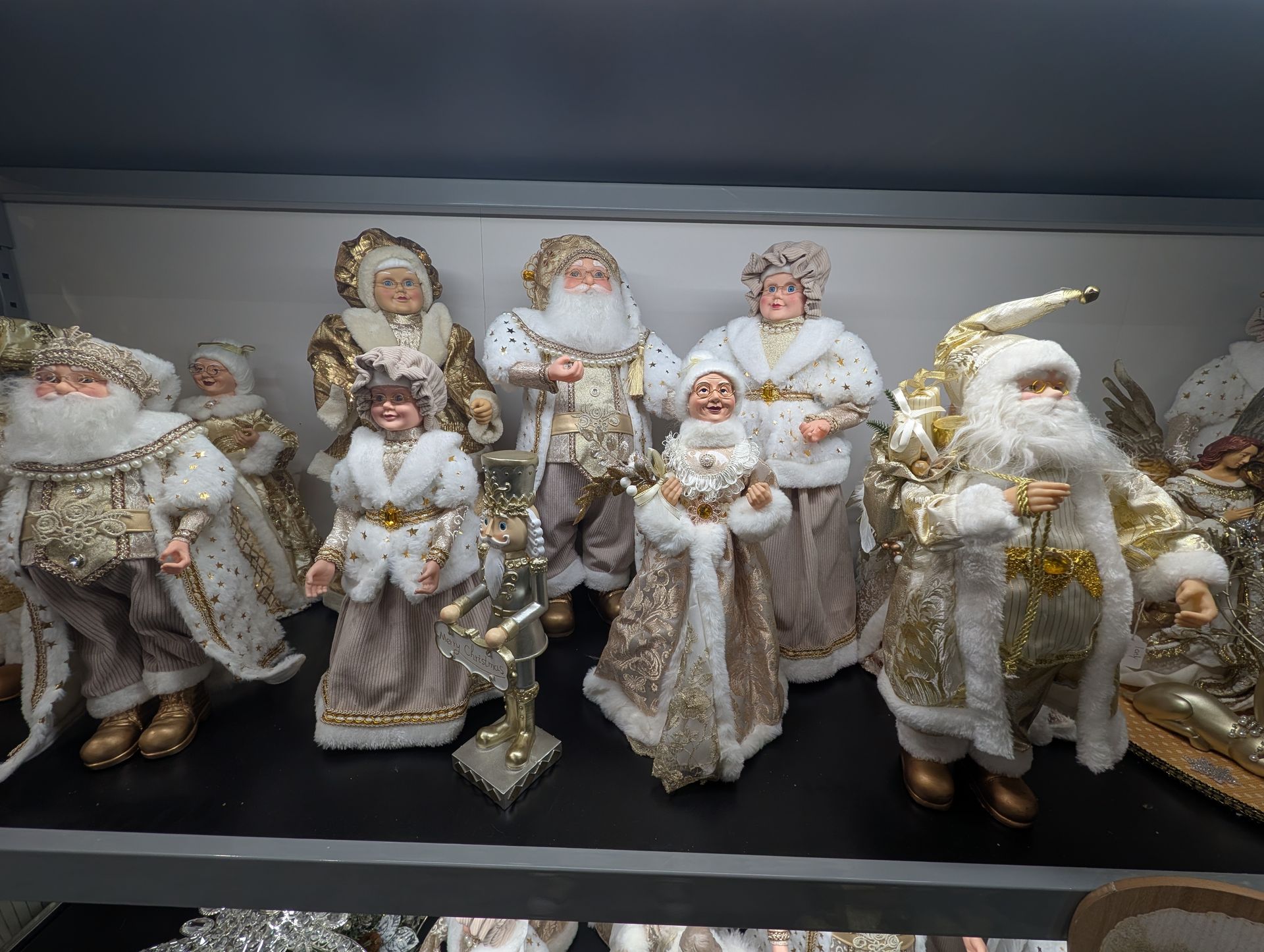 Elegant Santa Claus Figurine in White and Gold — Jingle Bell Christmas In Casino, NSW