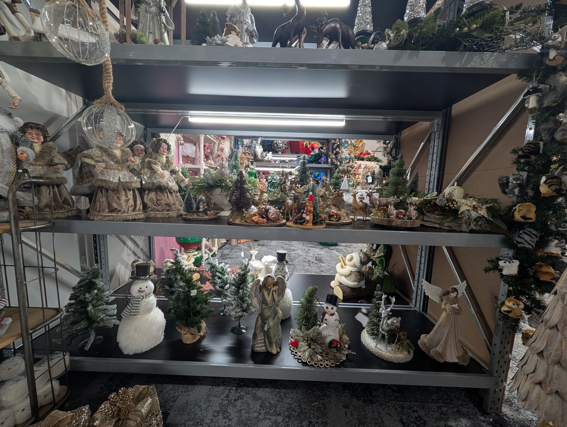 Shelves of Assorted Small Holiday Figurines and Decorations — Jingle Bell Christmas In Casino, NSW