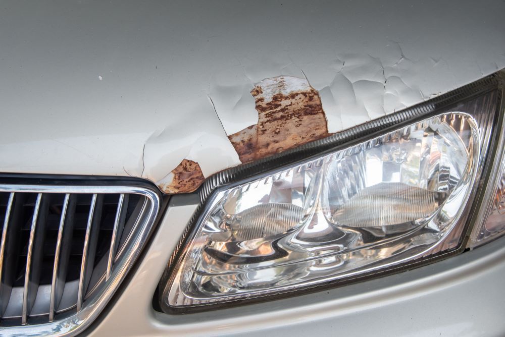 A Close Up of a Car Headlight With Rust on It — Vanderpoel Smash Repairs in Tuggerah, NSW
