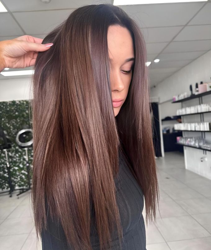 A Woman With Long Brown Hair — Beautique Hair Lounge & Beauty Bar In Condon, QLD