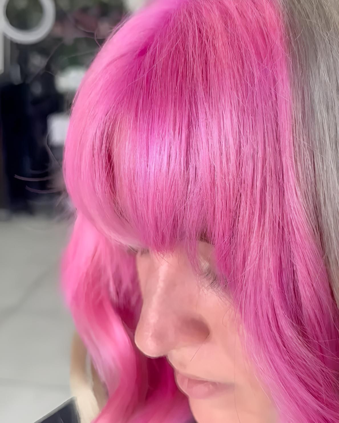 A Close Up Of A Woman 's Face With Pink Hair — Beautique Hair Lounge & Beauty Bar In Condon, QLD