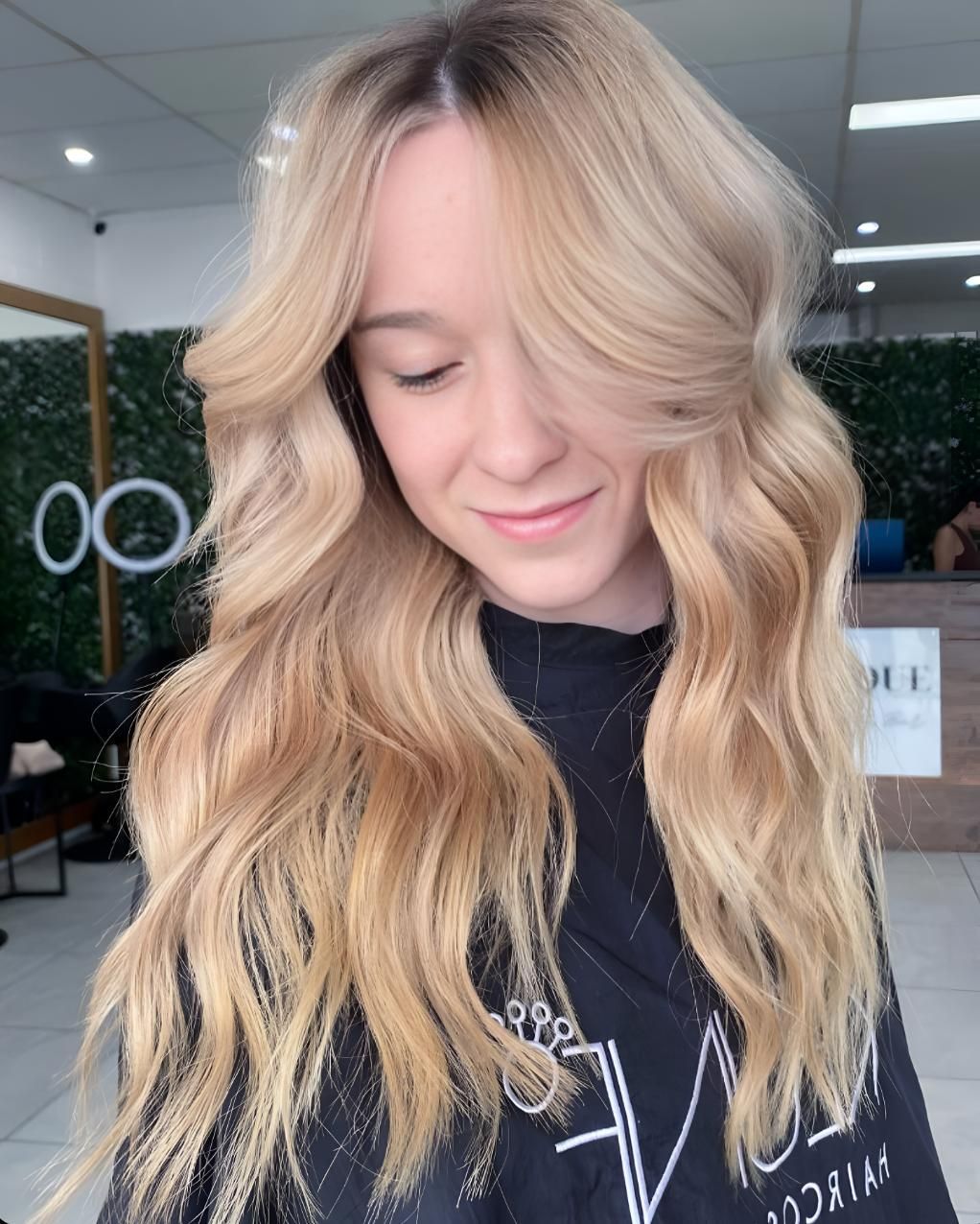 A Woman With Long Blonde Hair — Beautique Hair Lounge & Beauty Bar In Condon, QLD