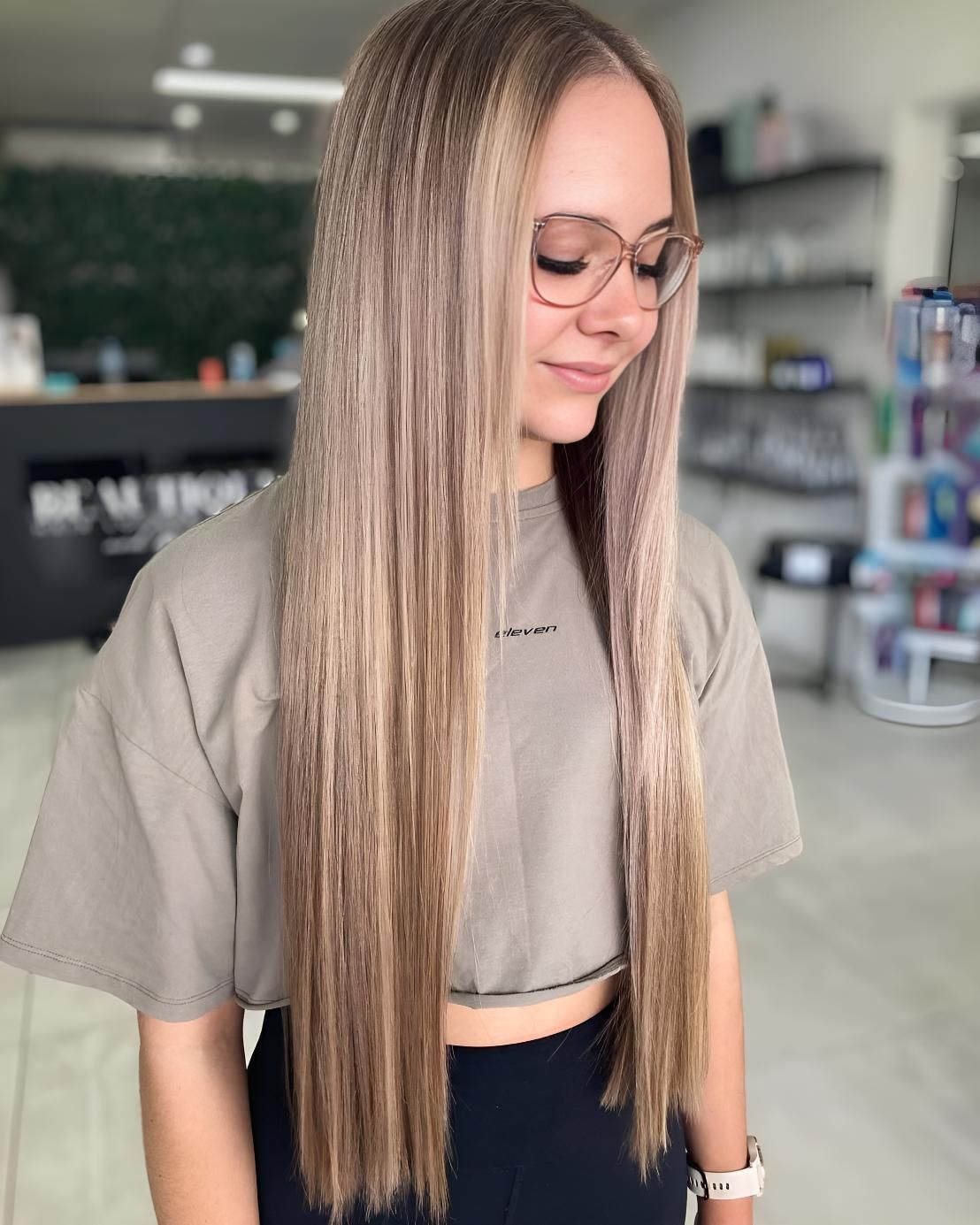A Woman With Long Blonde Hair — Beautique Hair Lounge & Beauty Bar In Charters Towers, QLD