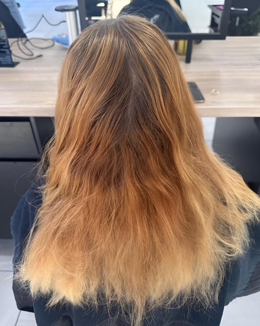 A Woman With Long Blonde Hair — Beautique Hair Lounge & Beauty Bar In Condon, QLD