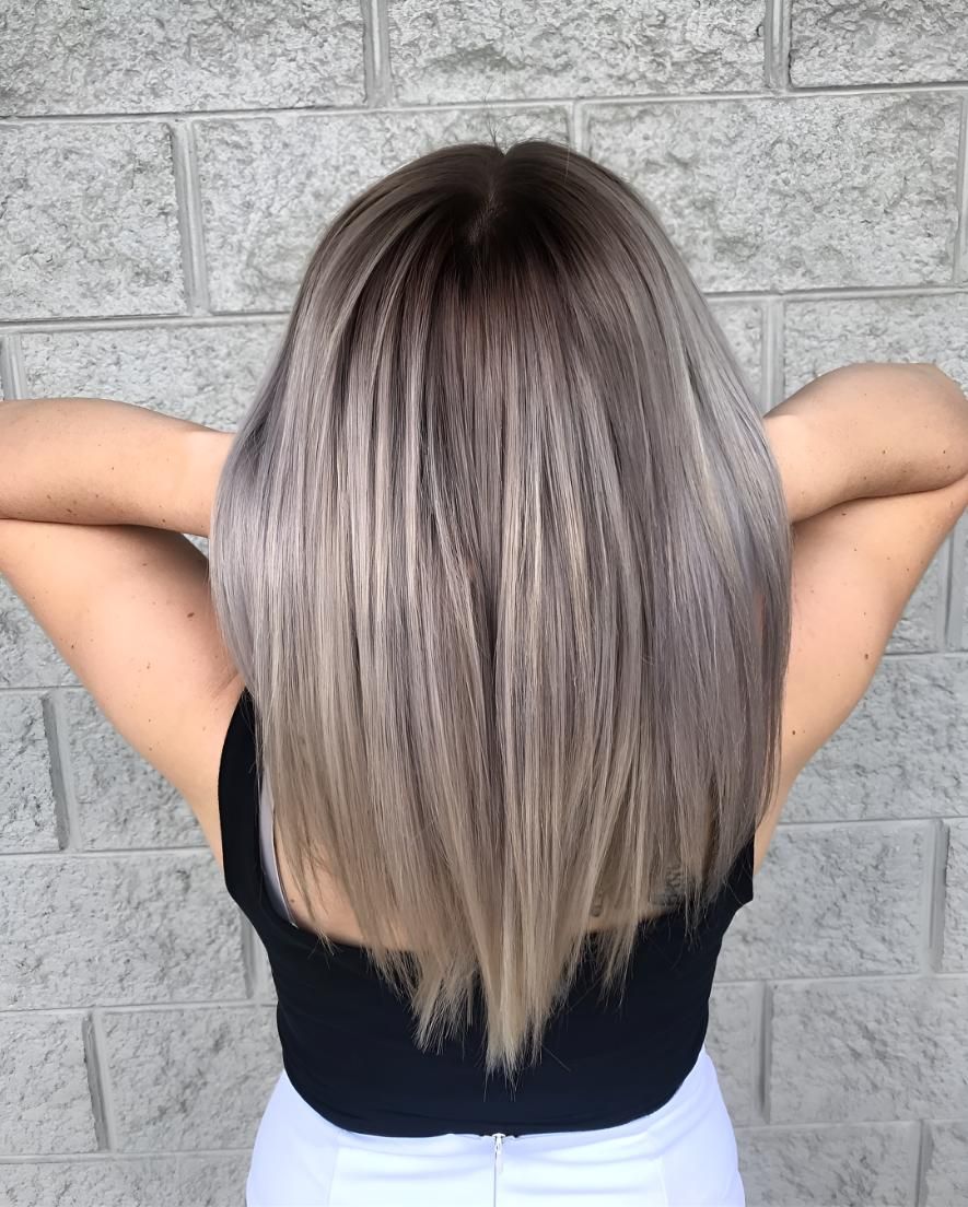 A Woman With Gray Hair Is Standing — Beautique Hair Lounge & Beauty Bar In Condon, QLD