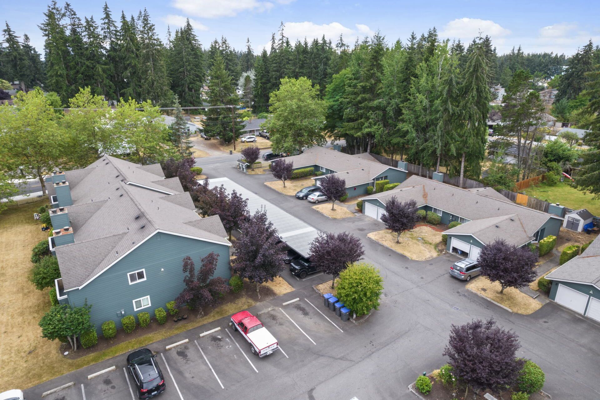 Aerial view of complex and parking lot