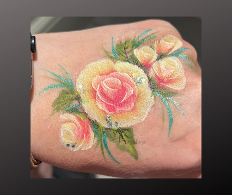  Floral one stroke rose design face paint by Paula Bargh Derbyshire face painter