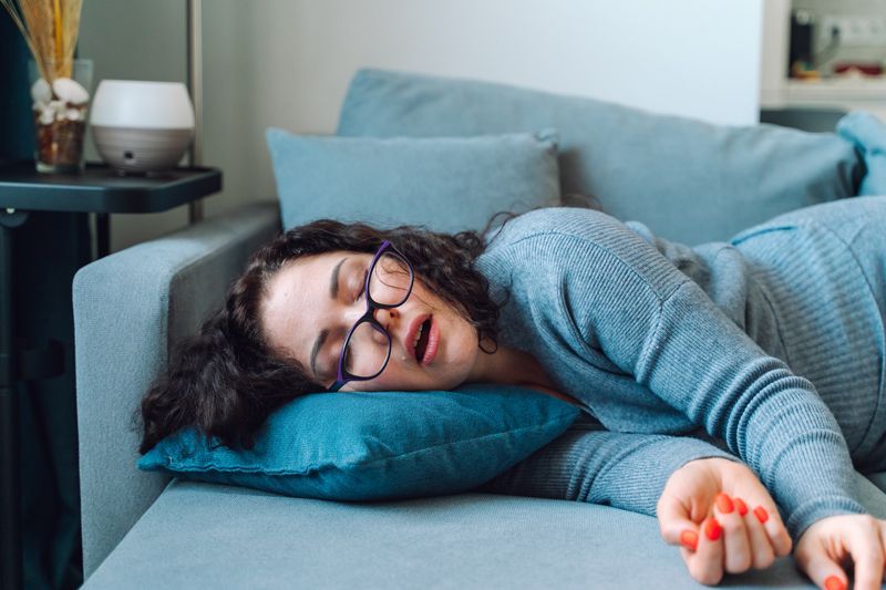 Woman Sleep At Home On Her Sofa - Indianapolis, IN - Sleep Better Indy Woman Sleep At Home On Her Sofa - Indianapolis, IN - Sleep Better Indy