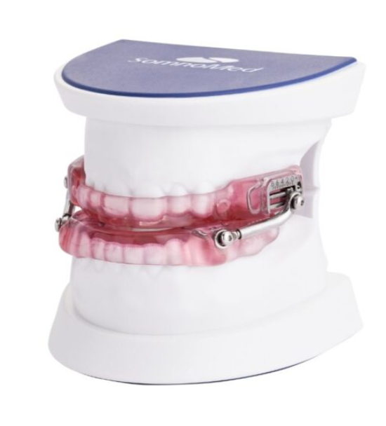 A model of a mouth with braces on it