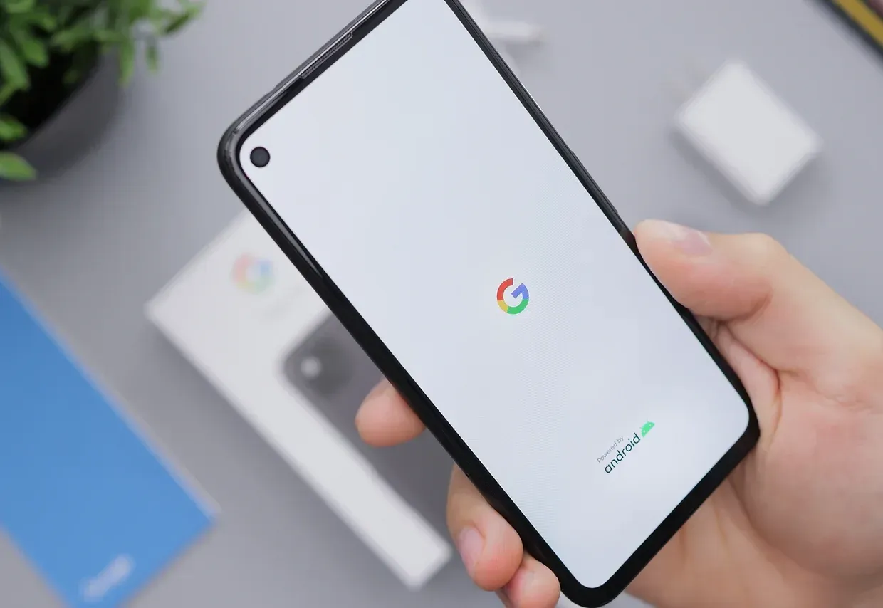A person is holding a google phone in their hand