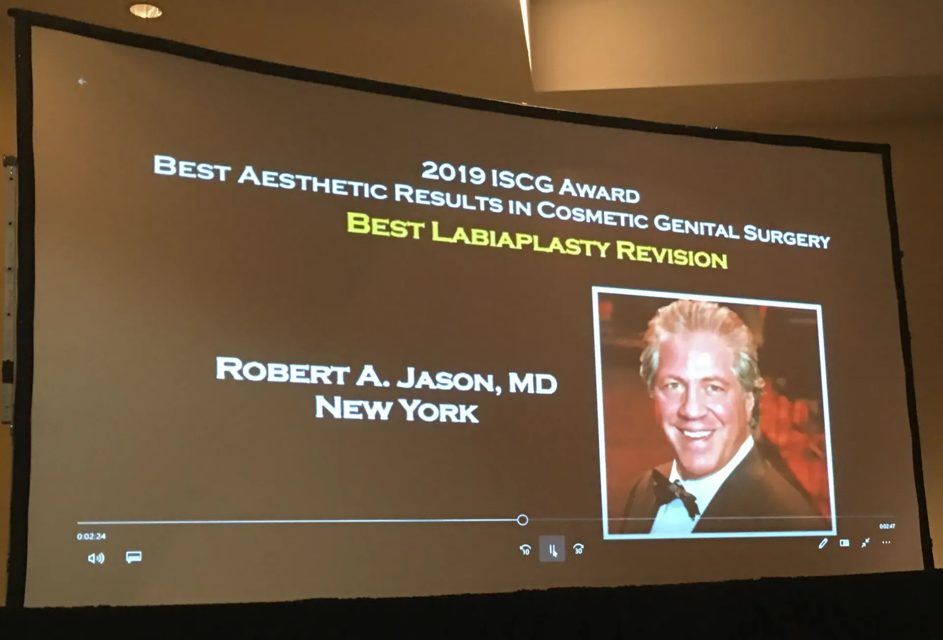 Slide: 2019 ISCG Award, Best Aesthetic Results in Cosmetic Genital Surgery, Best Labiaplasty Revision, Robert A. Jason, MD, New York.