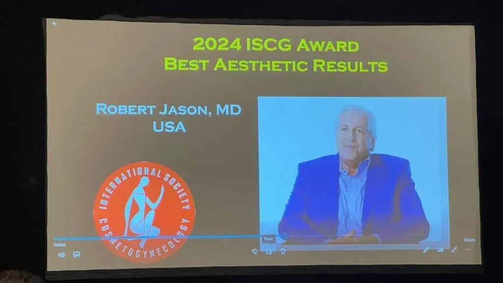 Presentation screen announcing Robert Jason, MD, USA, as the 2024 ISCG Award winner for Best Aesthetic Results. Includes a portrait of the doctor.