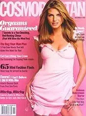 Cosmopolitan magazine cover with a woman in a pink dress, bold pink headline 