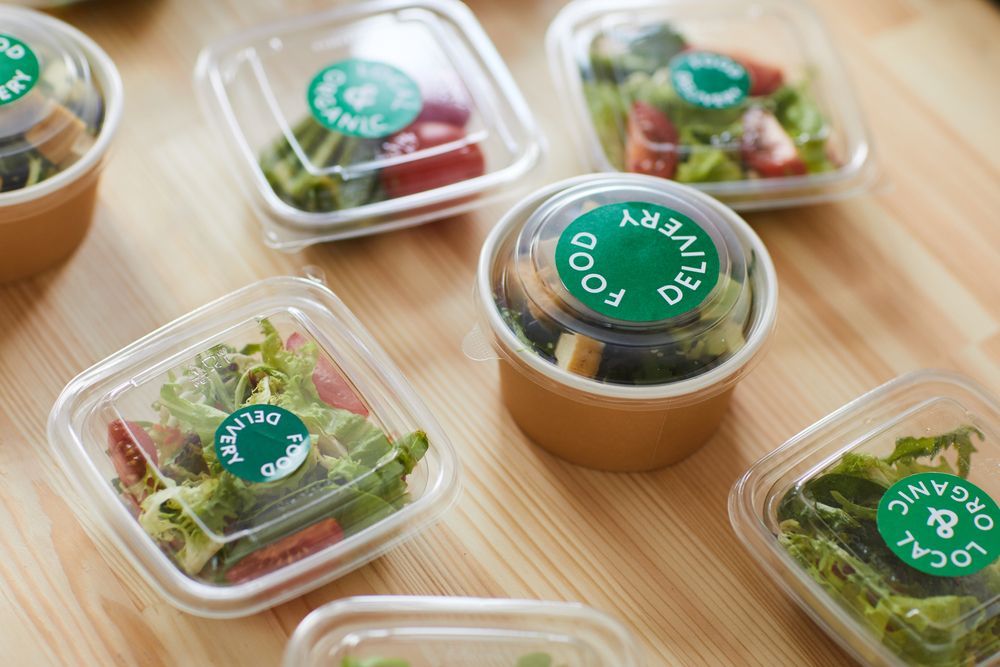 Clear Plastic Meal Containers with Green Labels — Home Nursing Services in Liverpool, NSW