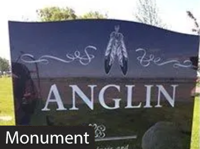 Black monument sign reading “ANGLIN” with an insect emblem and decorative white swirls