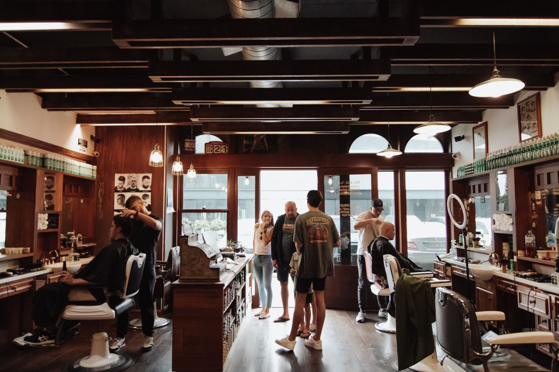 People Walking Out Of Barber Shop — Barber Bros & Co - Southport in Isle of Capri, QLD