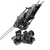 Black professional cinema camera mounted on a Cablecam arm against a white background