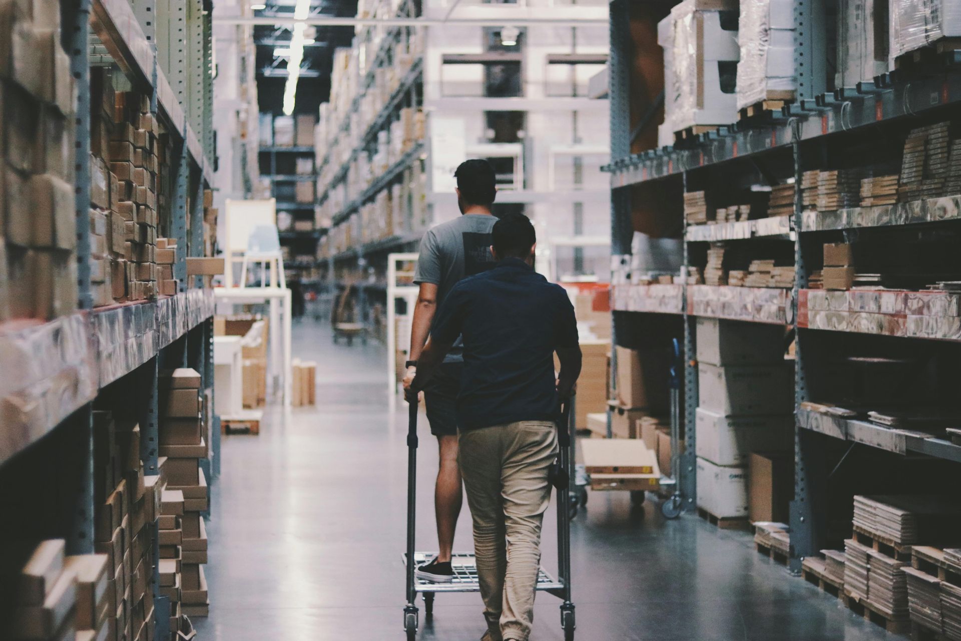 Warehouse forklift moving pallets for industrial and packaging supply logistics