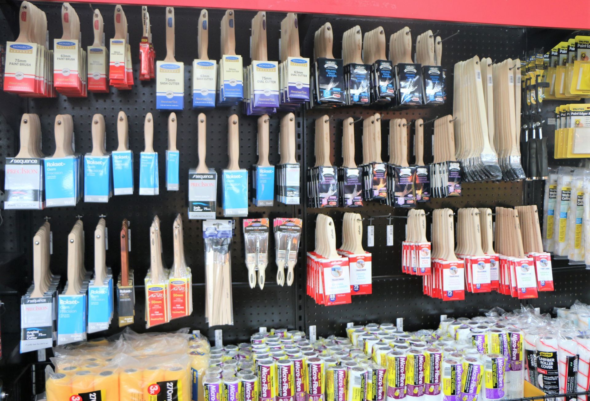 Bunch of Paint Brushes Are Hanging on a Store — Paint & Decor in Mount Isa City, QLD